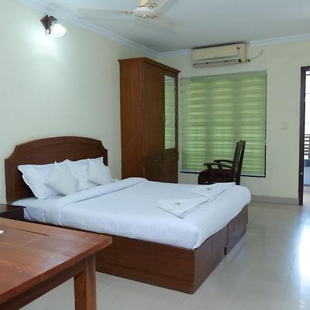 Hotel Lumiere Alappuzha Extérieur photo